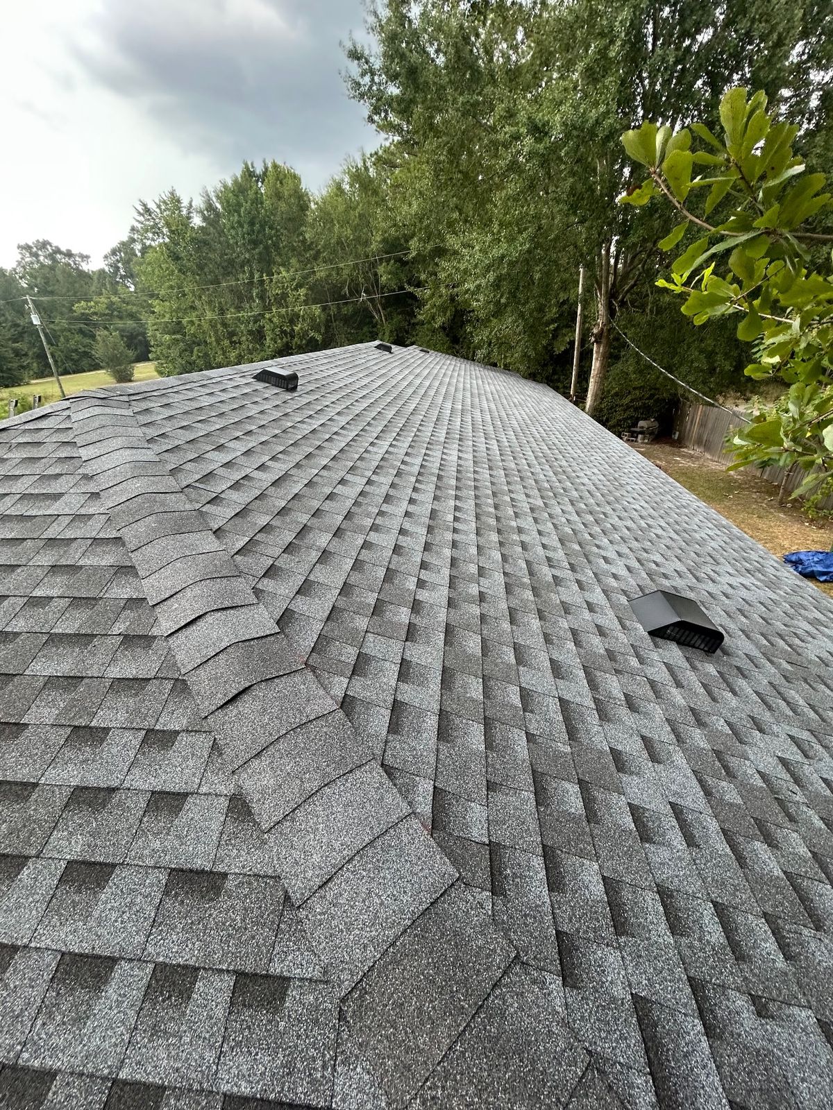 After photo of a GAF Timberline HDZ shingle roof in Pewter Gray completed by Southeast Roofing in Leakesville, MS.