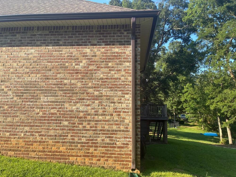 After photo of a Seamless 6" K-style gutters in Musket Brown completed by Southeast Roofing in Petal, MS.