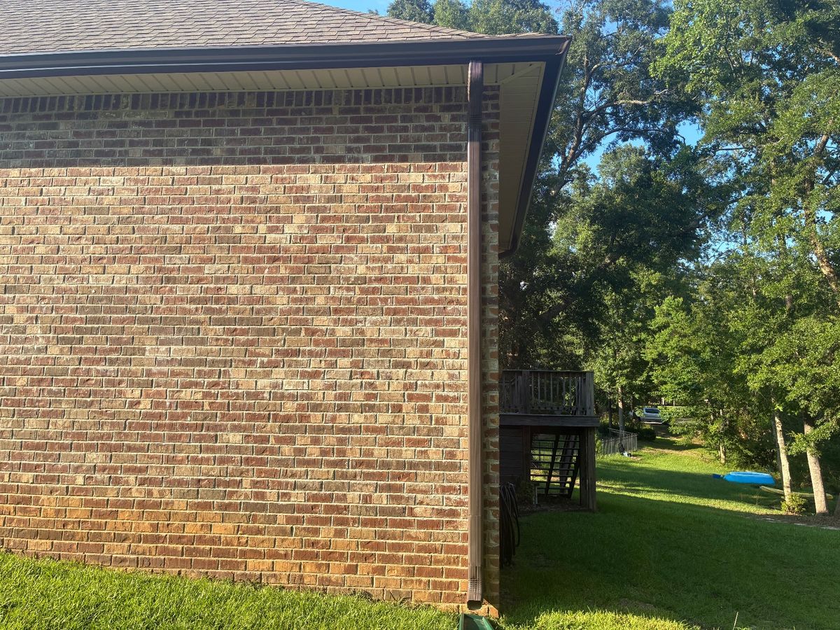 After photo of a Seamless 6" K-style gutters in Musket Brown completed by Southeast Roofing in Petal, MS.