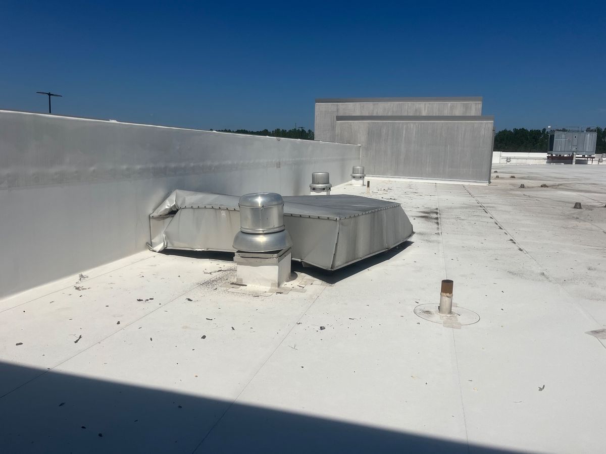Before photo of a storm-damaged roof before work by Southeast Roofing in Hattiesburg, MS.