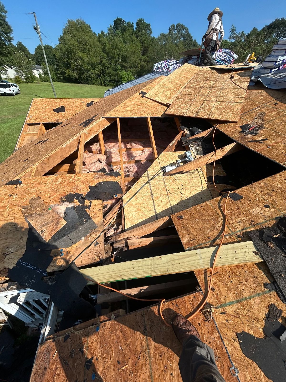 In Progress photo of a GAF Timberline HDZ shingle roof in Hickory being installed by Southeast Roofing in Bassfield, MS.