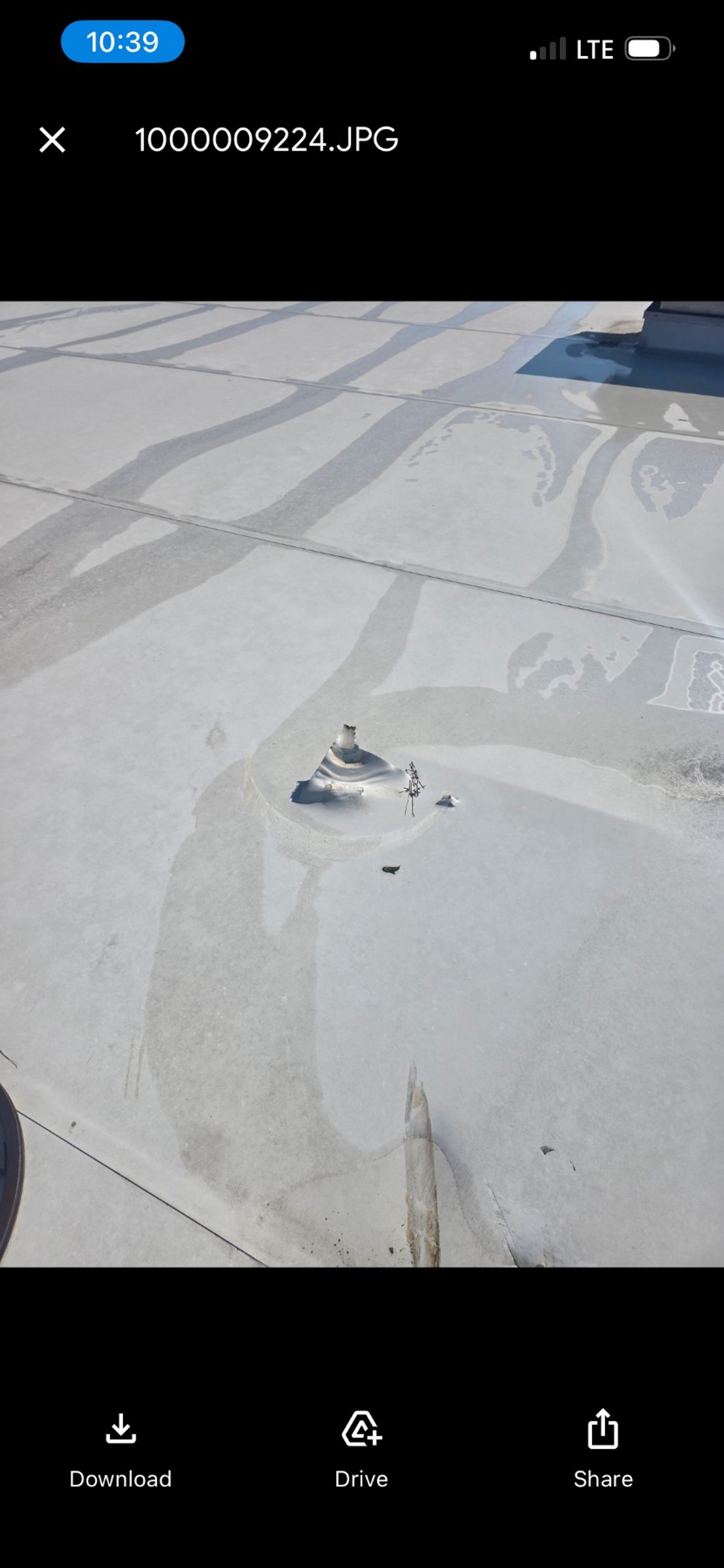 Before photo of a Silicone roof coating in White before work by Southeast Roofing in Hattiesburg, MS.
