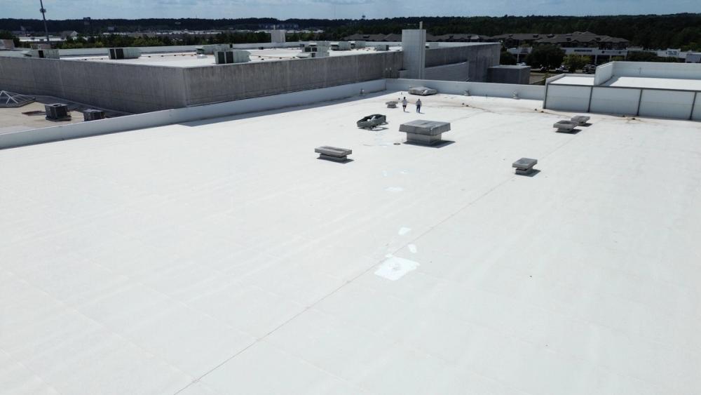 After photo of a Silicone roof coating in White completed by Southeast Roofing in Hattiesburg, MS.