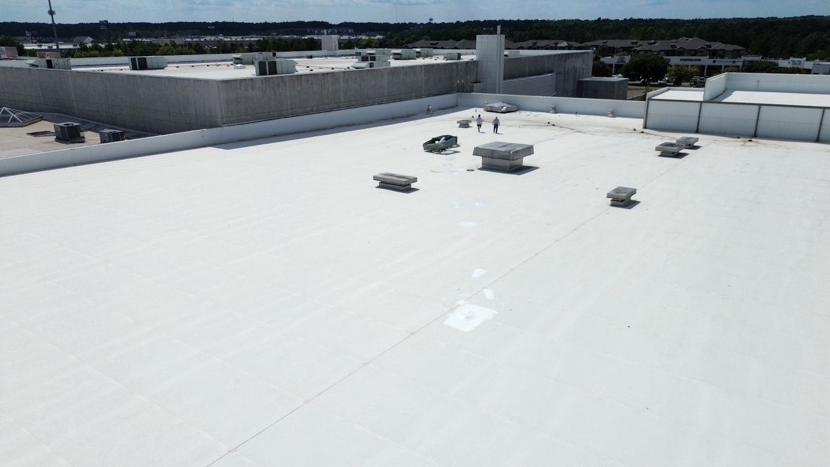 After photo of a Silicone roof coating in White completed by Southeast Roofing in Hattiesburg, MS.