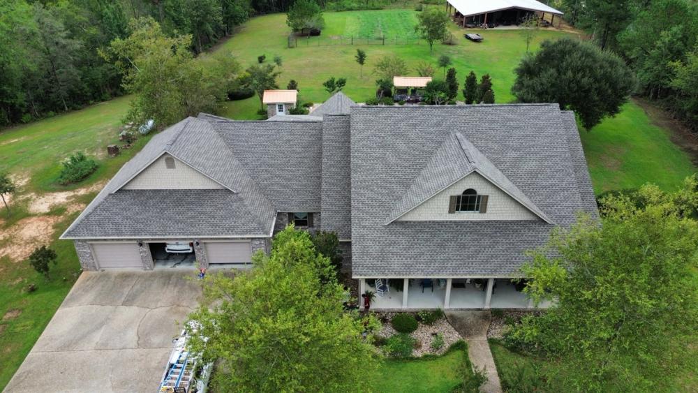 After photo of a GAF Timberline HDZ shingle roof in Weathered Wood completed by Southeast Roofing in Purvis, MS.