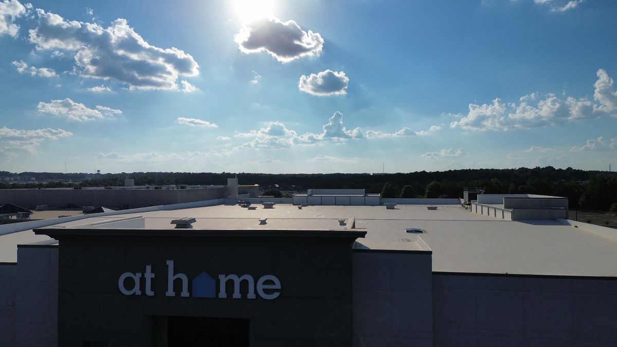 After photo of a Silicone roof coating in White completed by Southeast Roofing in Hattiesburg, MS.