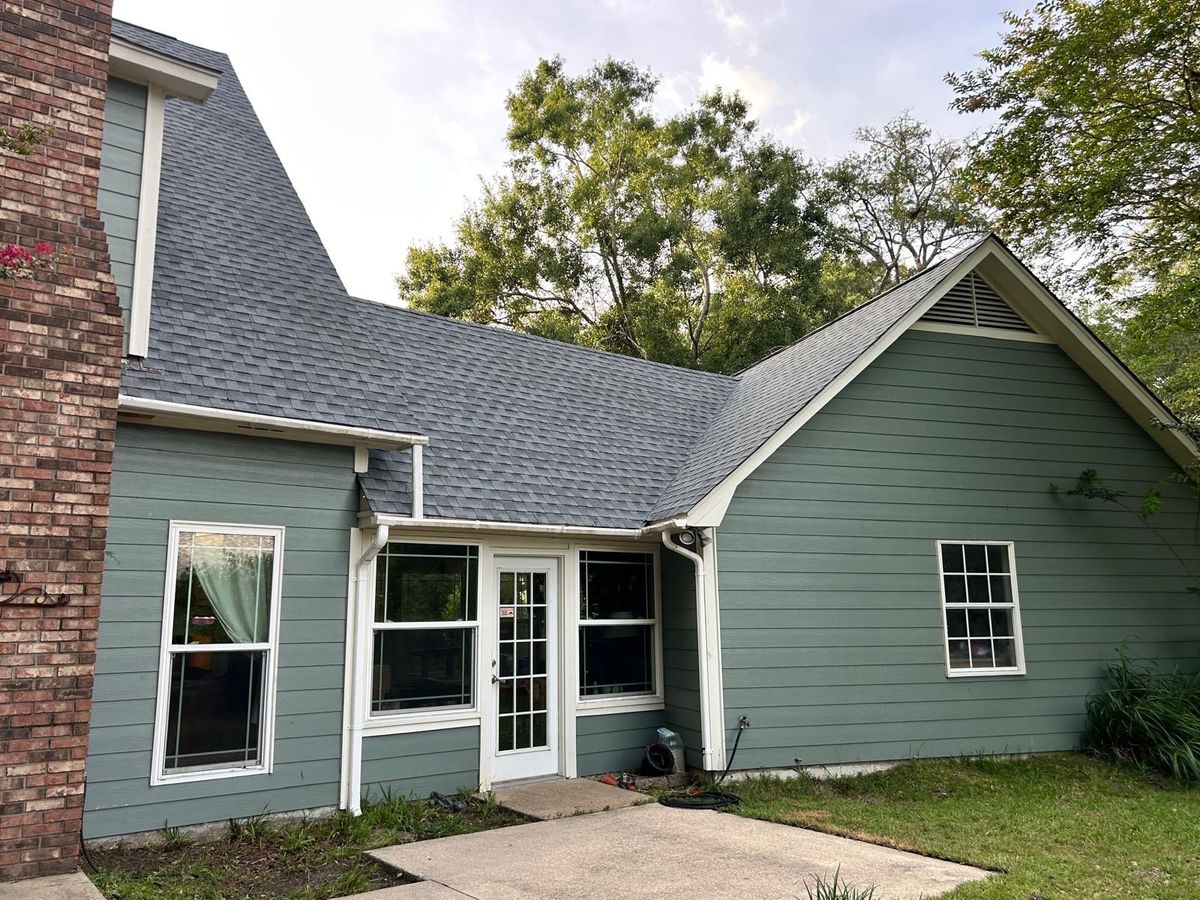 After photo of a GAF Timberline HDZ shingle roof in Oyster Gray completed by Southeast Roofing in Ocean Springs, MS.