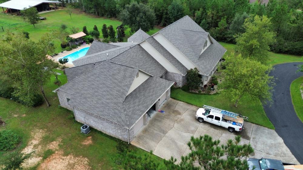 After photo of a GAF Timberline HDZ shingle roof in Weathered Wood completed by Southeast Roofing in Purvis, MS.