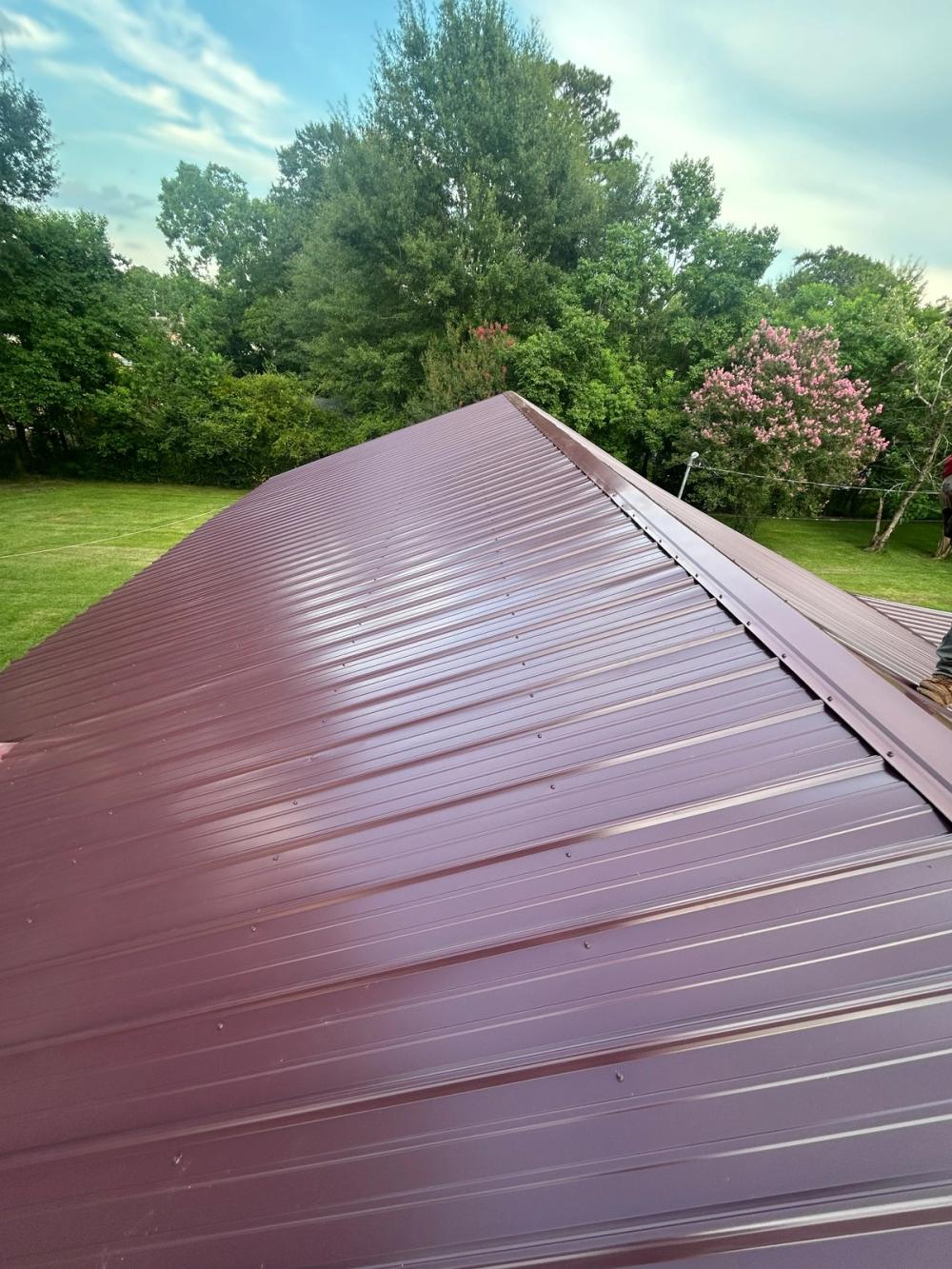 After photo of a 29ga Gibraltar Rib metal roof in Burgundy completed by Southeast Roofing in Hattiesburg, MS.