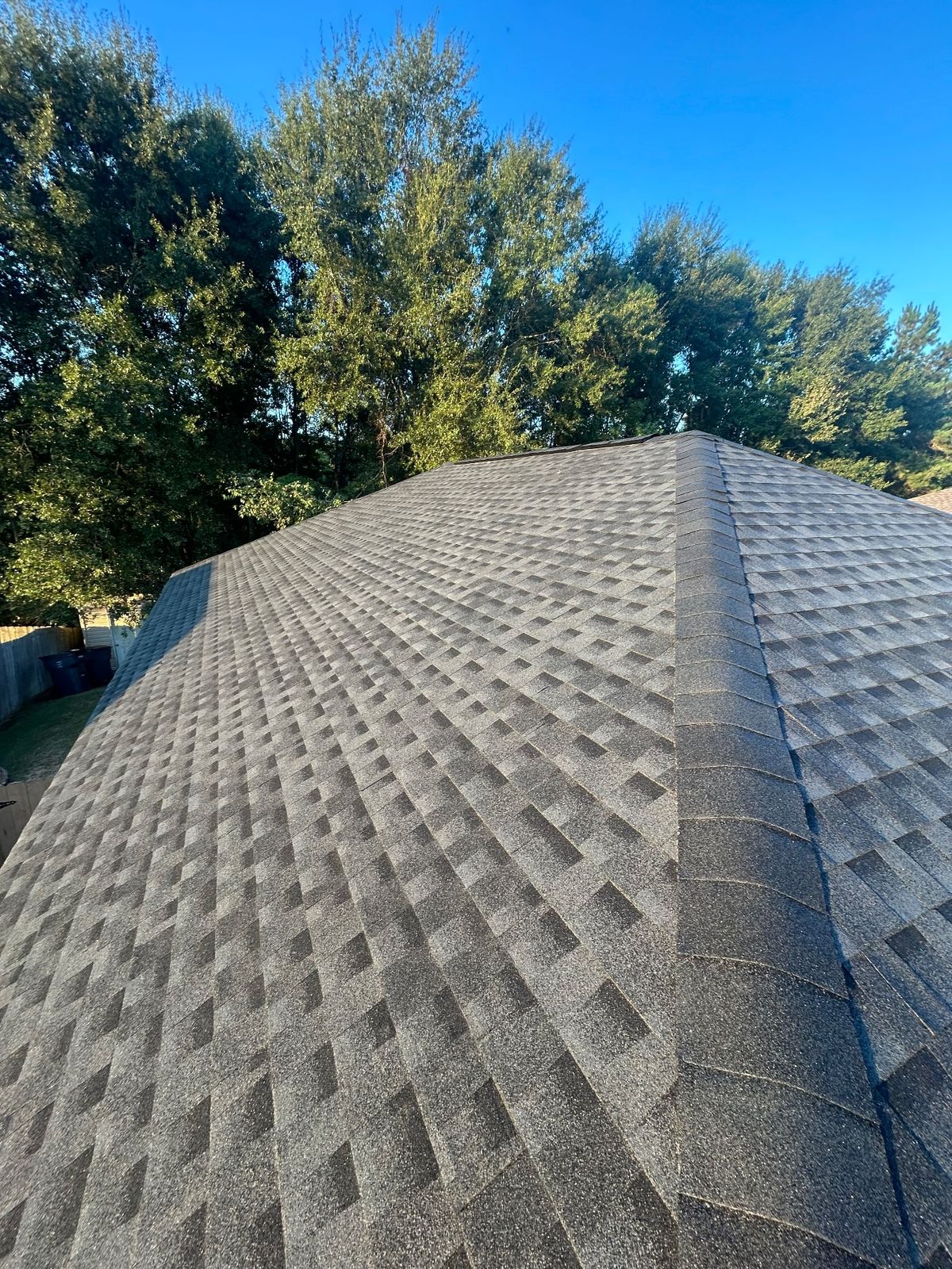 After photo of a GAF Timberline HDZ shingle roof in Charcoal completed by Southeast Roofing in Hattiesburg, MS.