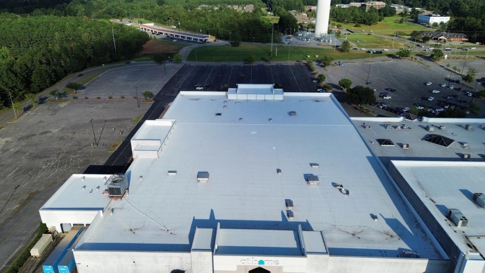 After photo of a Silicone roof coating in White completed by Southeast Roofing in Hattiesburg, MS.