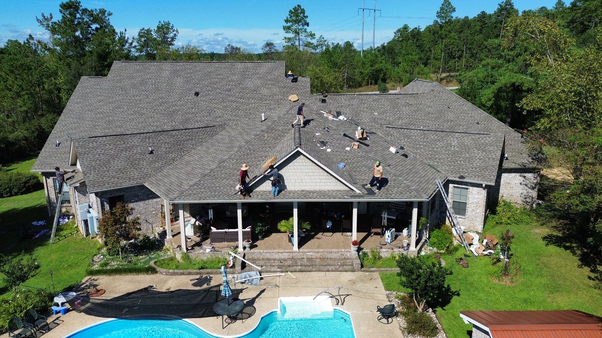 In Progress photo of a GAF Timberline HDZ shingle roof in Weathered Wood being installed by Southeast Roofing in Purvis, MS.