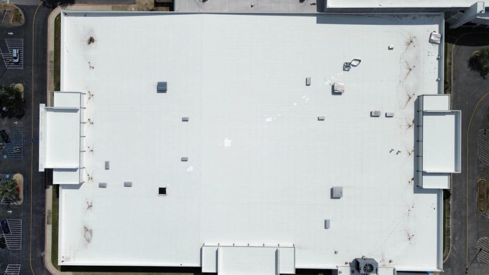 After photo of a Silicone roof coating in White completed by Southeast Roofing in Hattiesburg, MS.