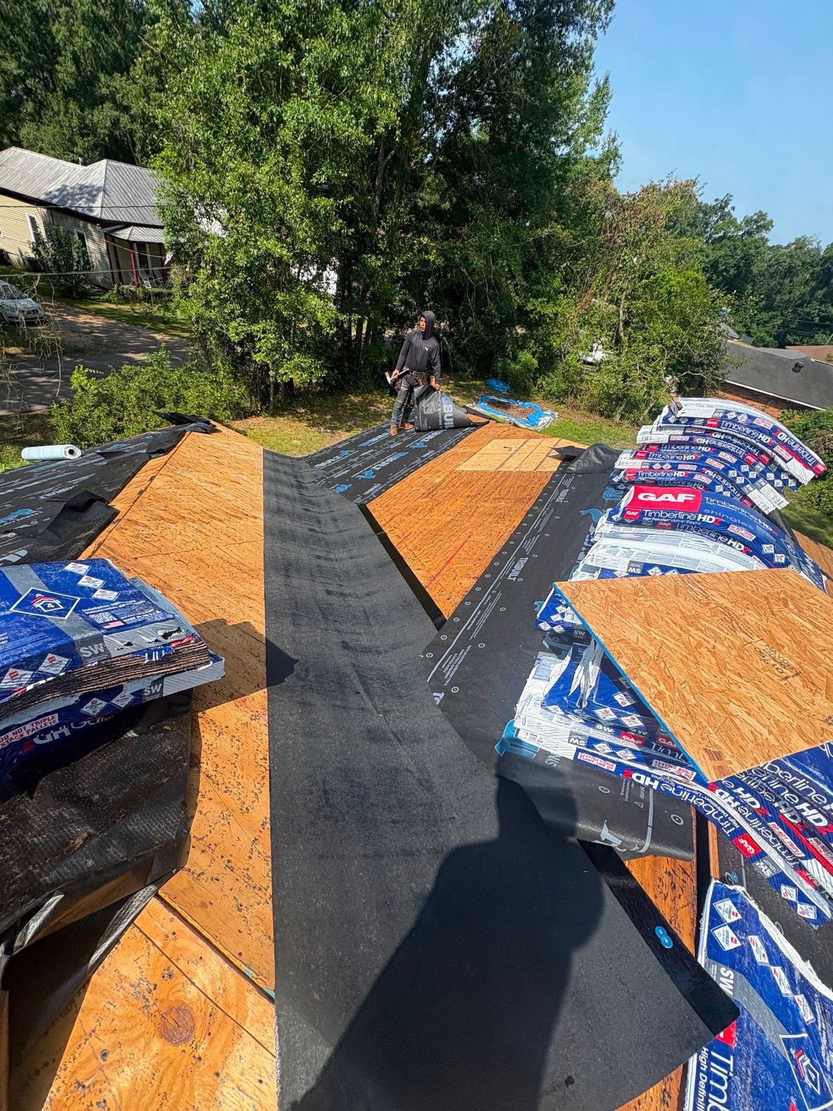 In Progress photo of a GAF Timberline HDZ shingle roof in Shakewood being installed by Southeast Roofing in McComb, MS.