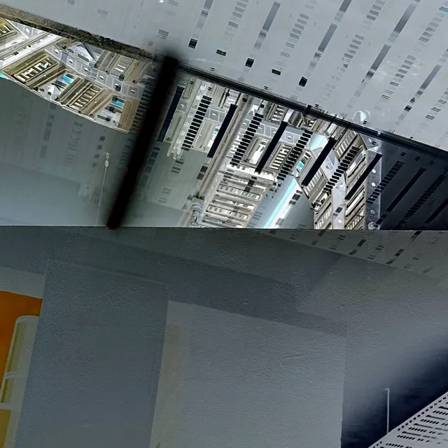 Images of an industrial ceiling, split into two parts in a single portrait image.