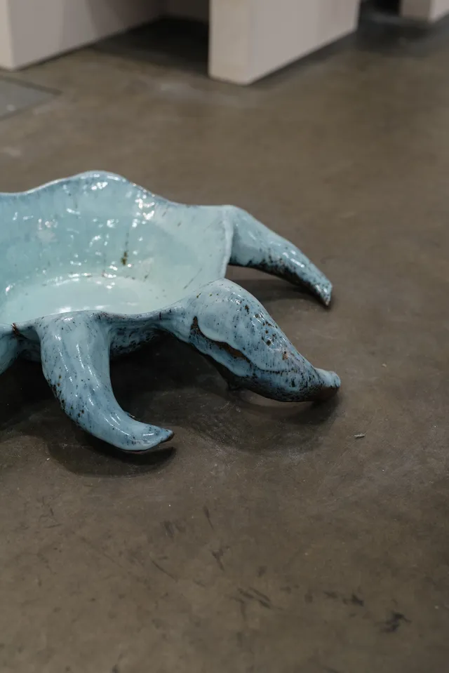 A blue ceramic piece.