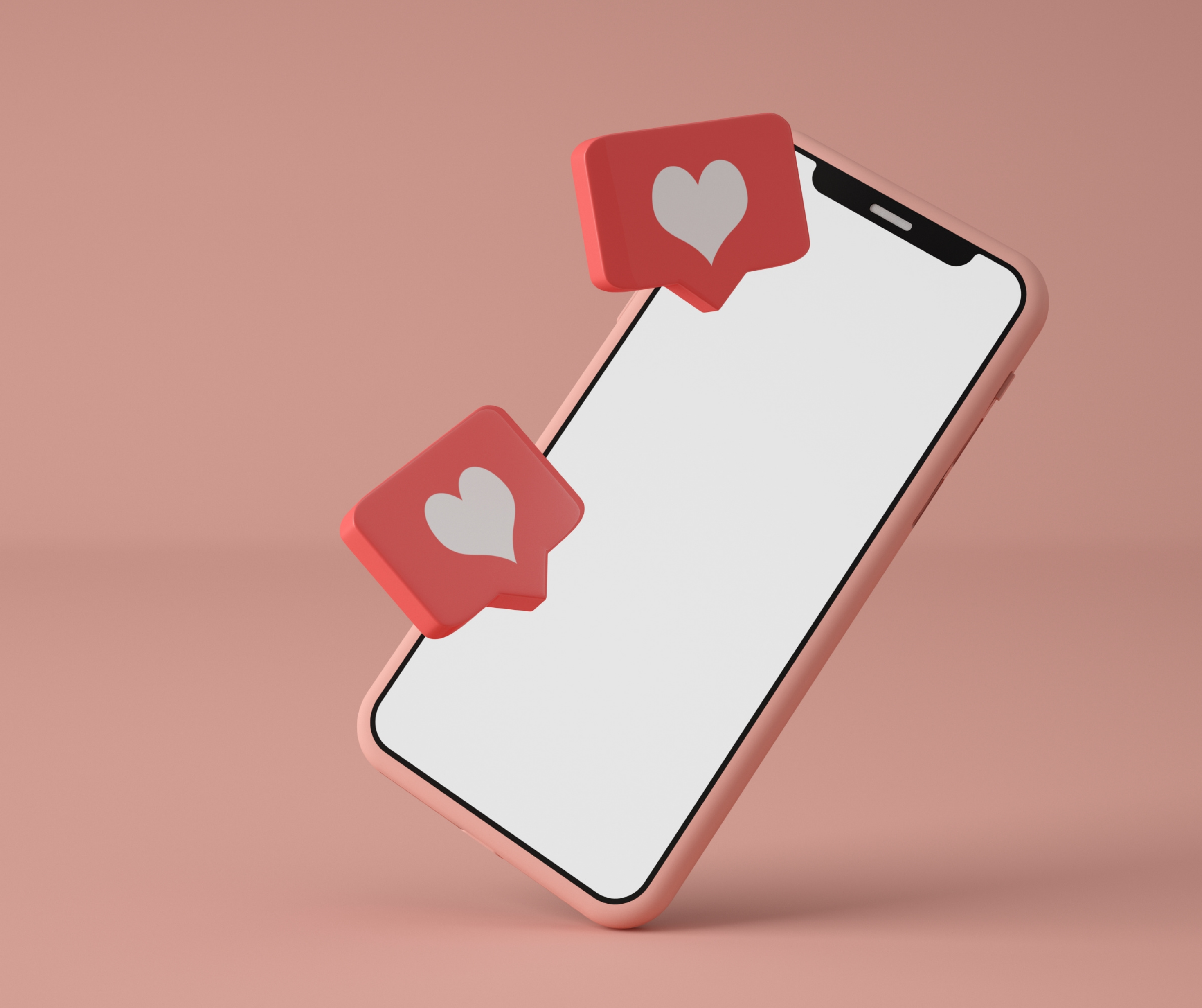 Mobile phone displaying social media likes and heart icons.