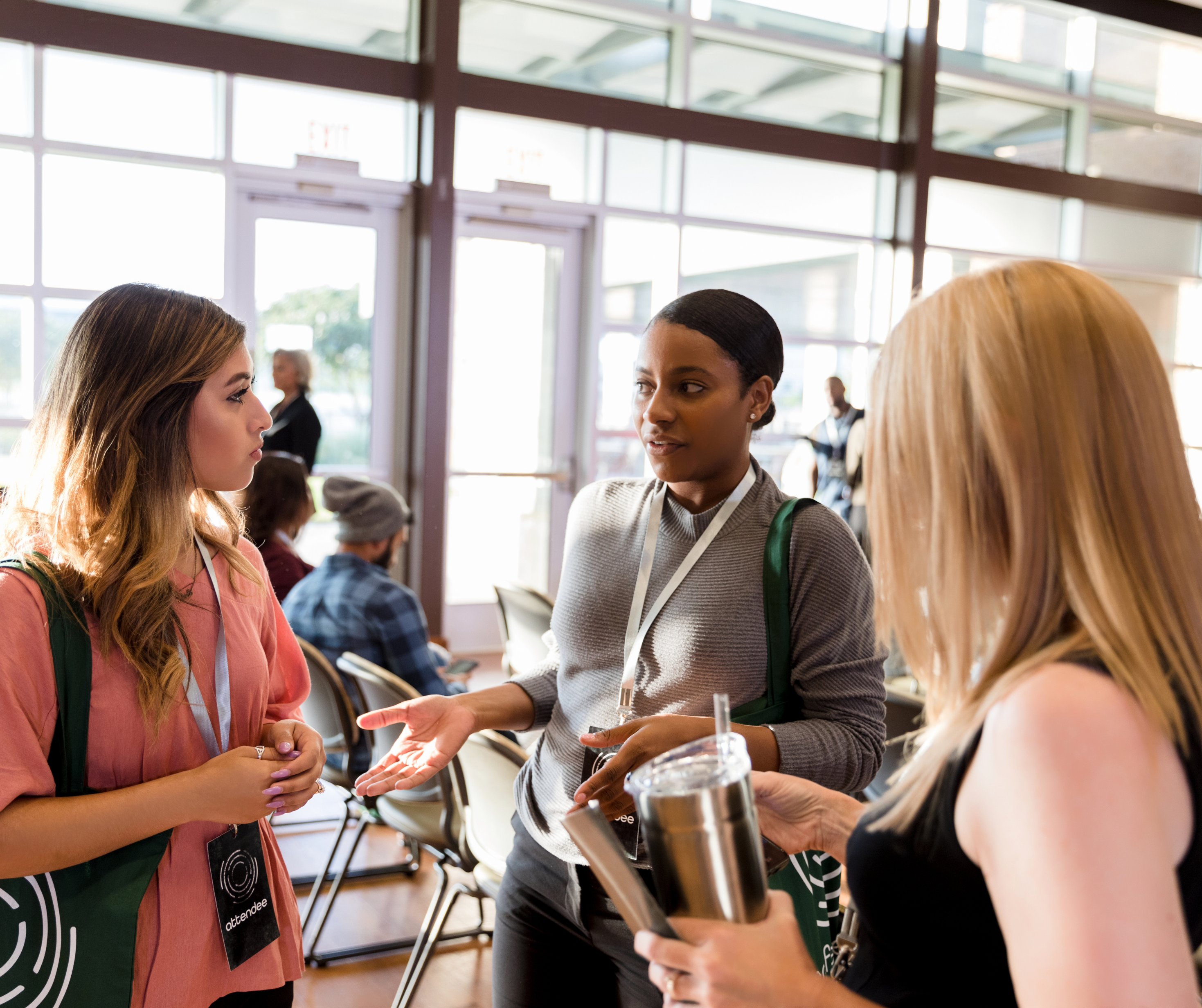 People networking and engaging in conversations at an event.