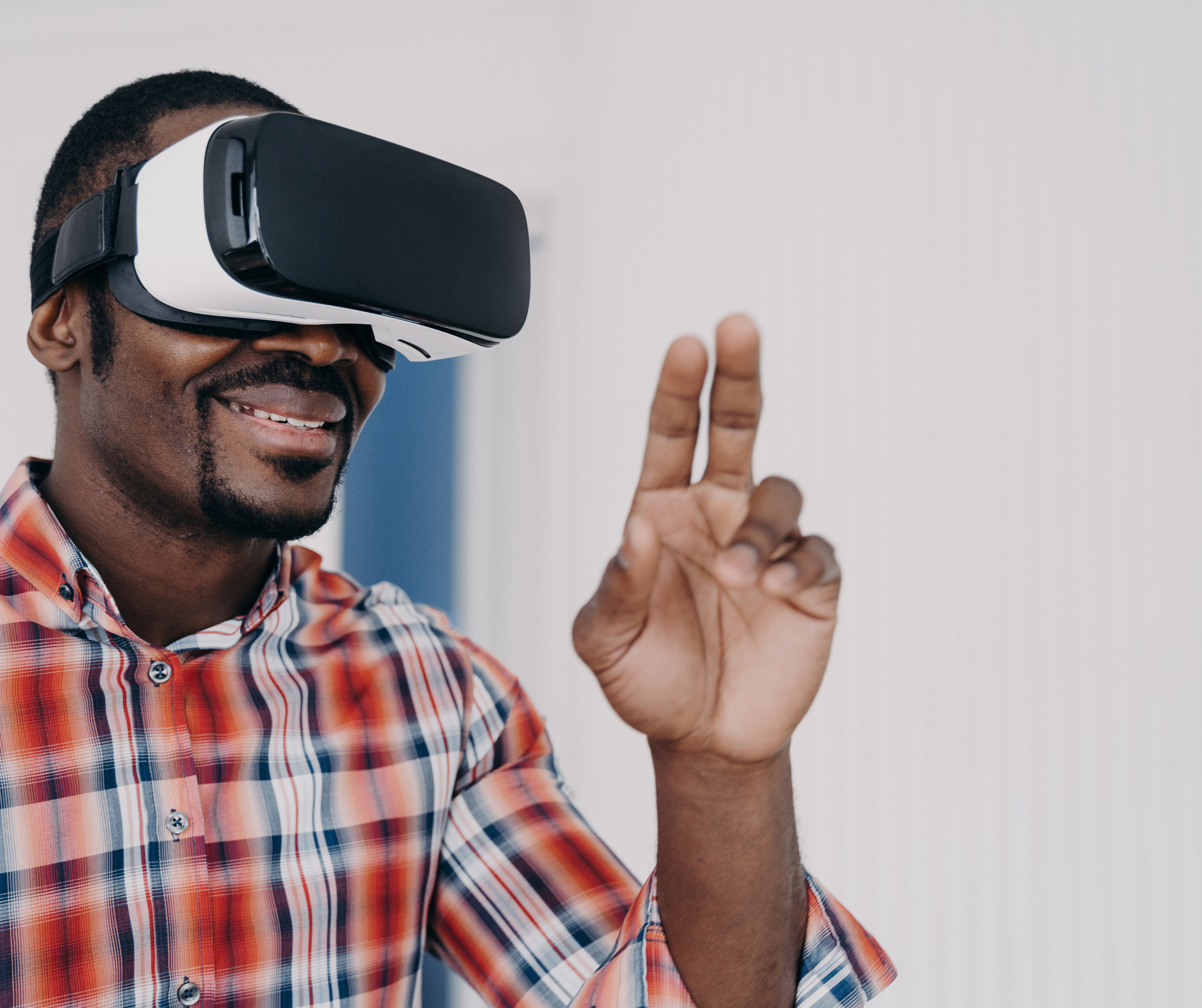 A man using augmented reality glasses, symbolizing enhanced product interaction in pop-up retail.