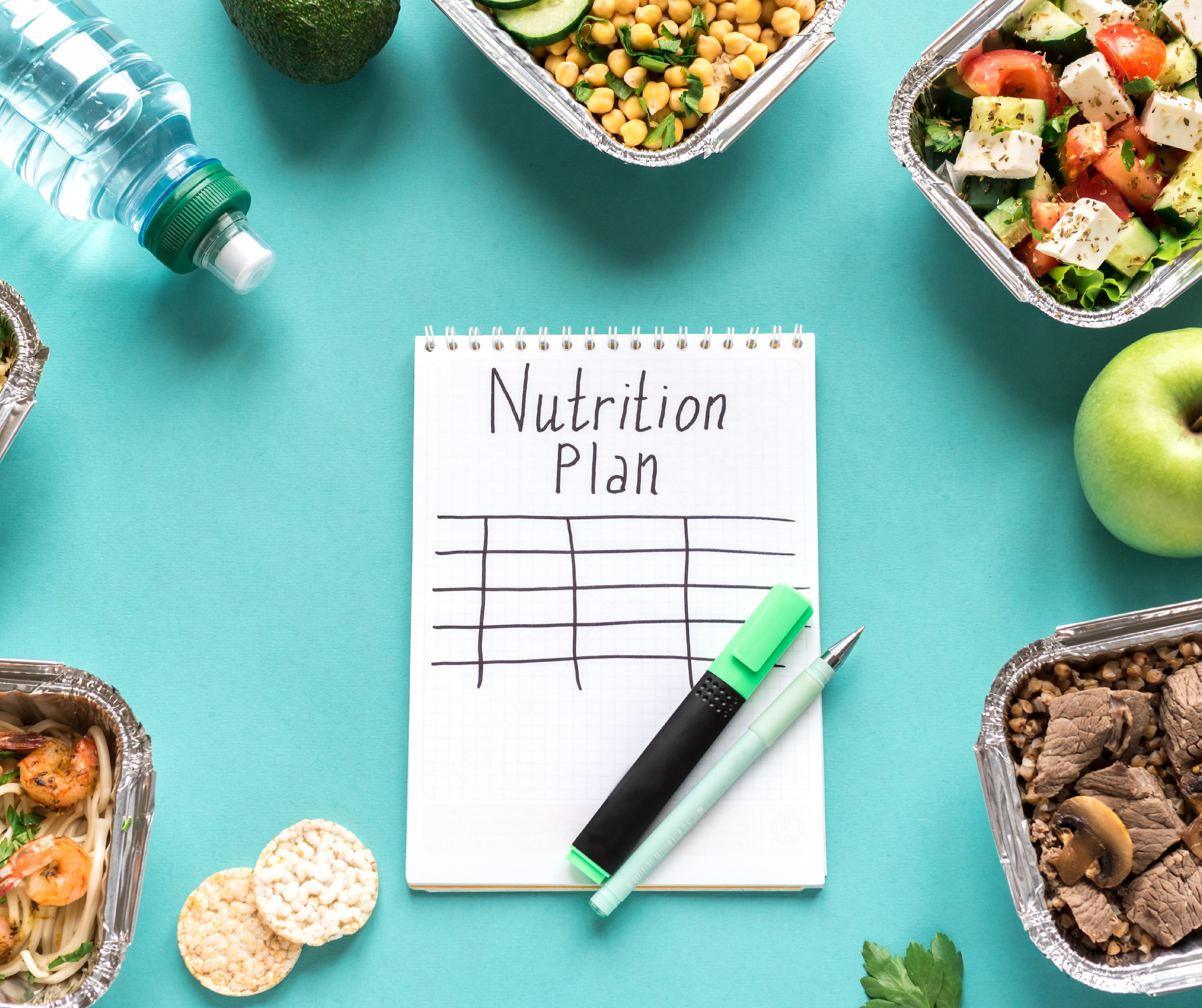 A notebook labeled "Nutrition Plan" surrounded by containers of healthy foods, such as salads, chickpeas, and a water bottle, on a turquoise background.