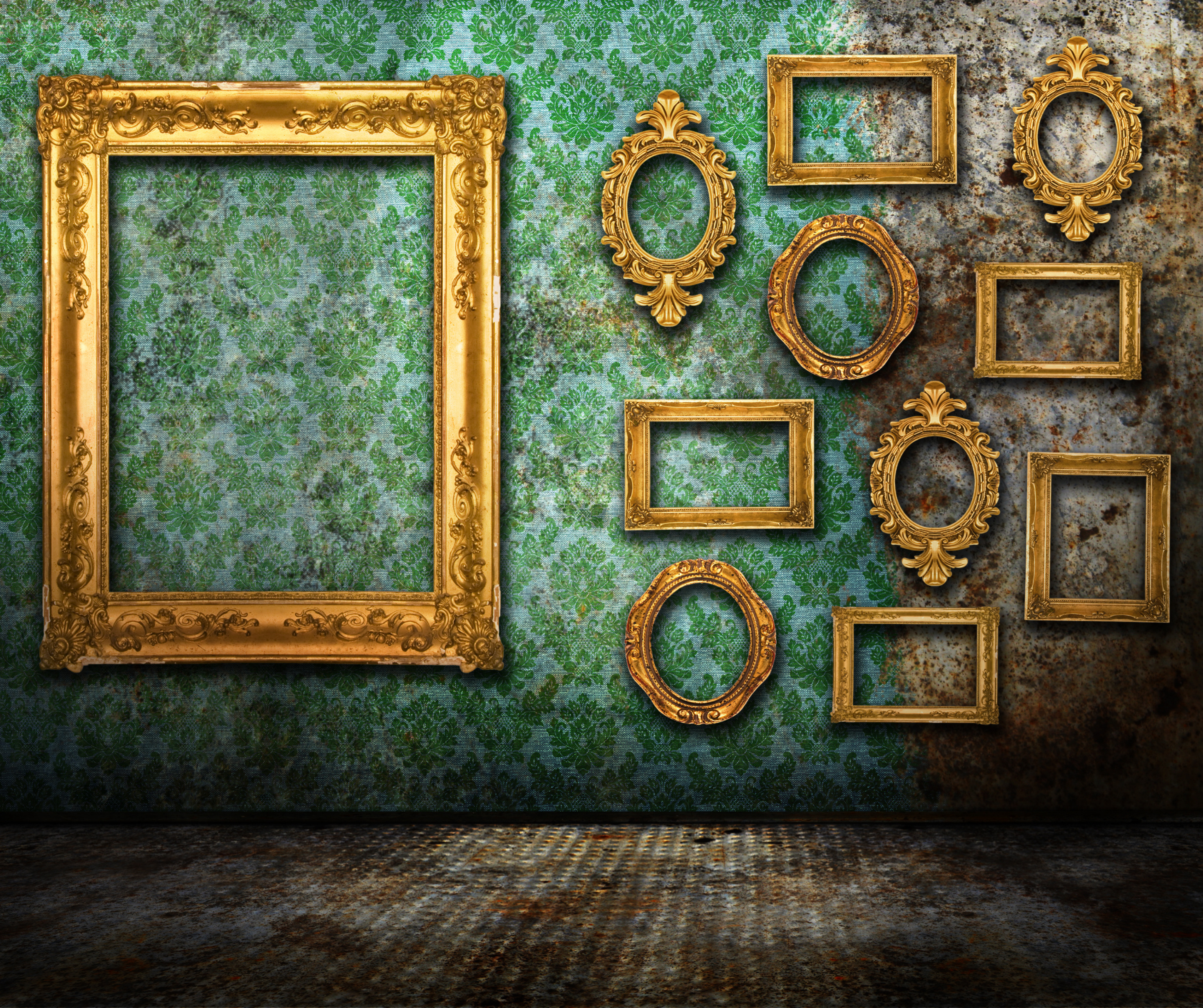 Various empty gold picture frames of different shapes and sizes arranged on a green patterned wallpaper.