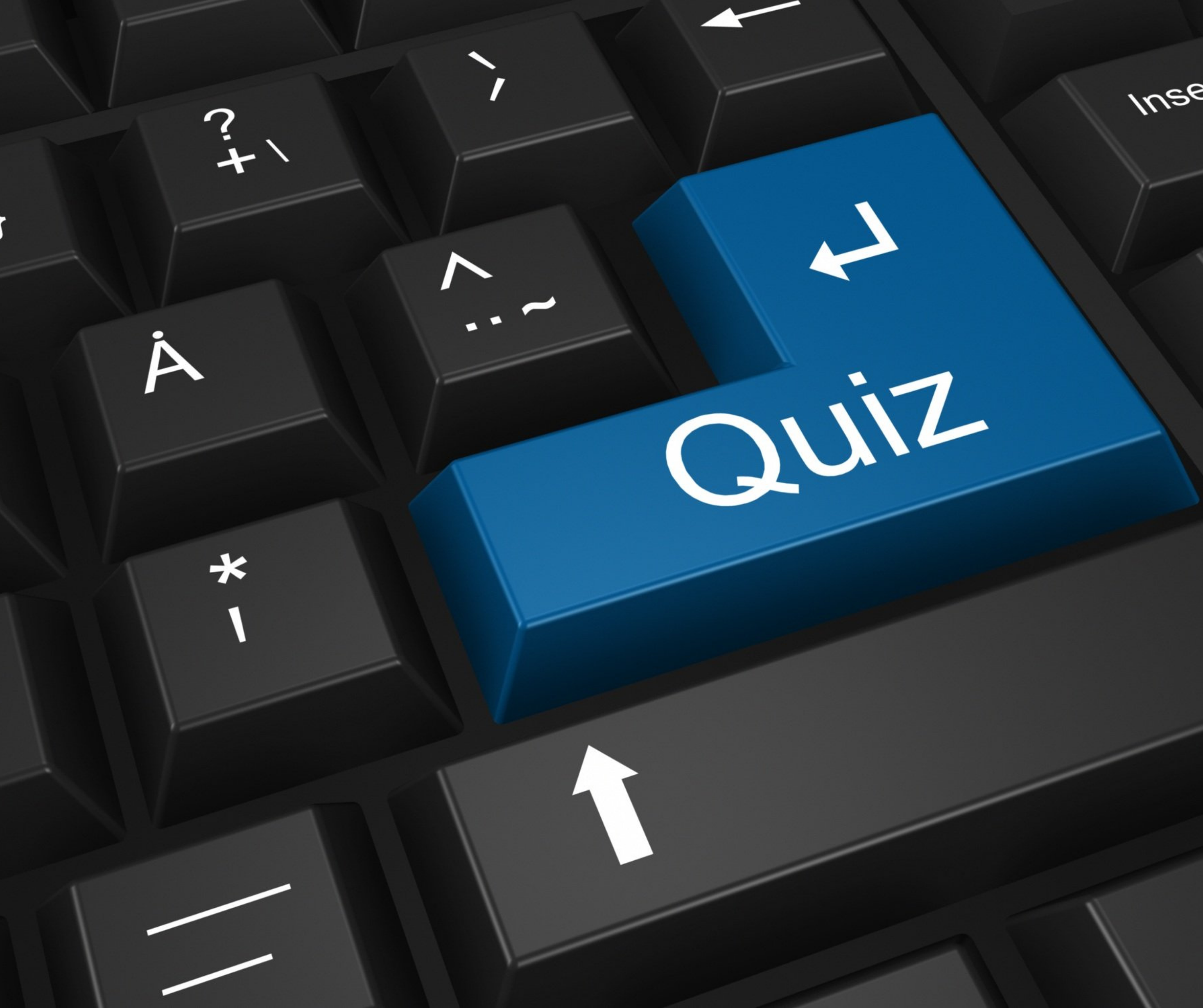 Keyboard with a blue 'Quiz' key, symbolizing a fashion quiz for personalized recommendations