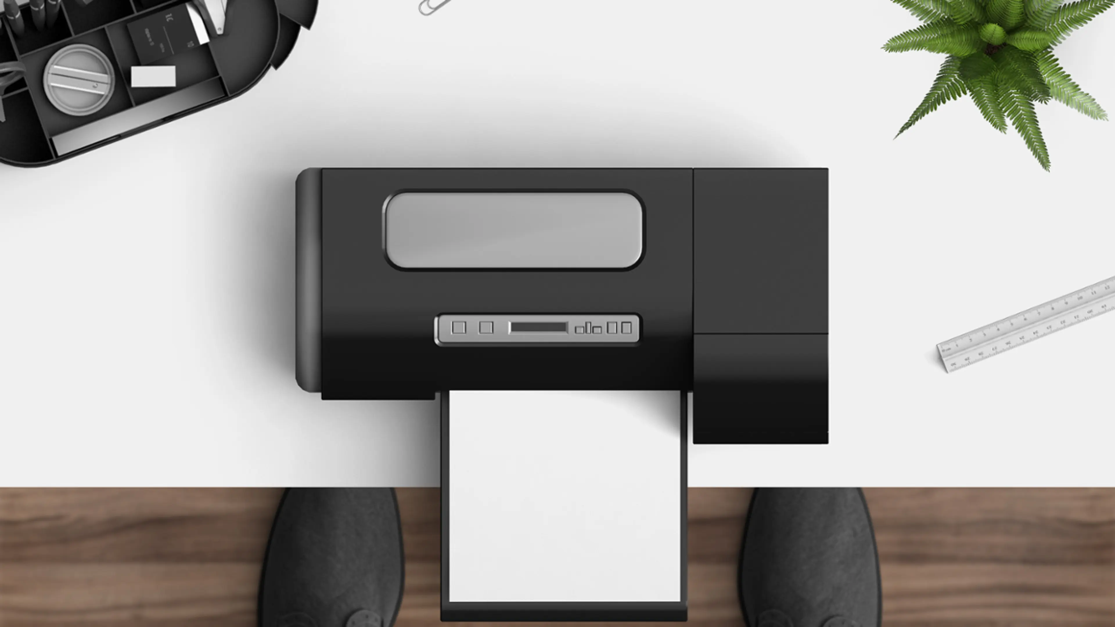 Printer som står på et arbeidsbord