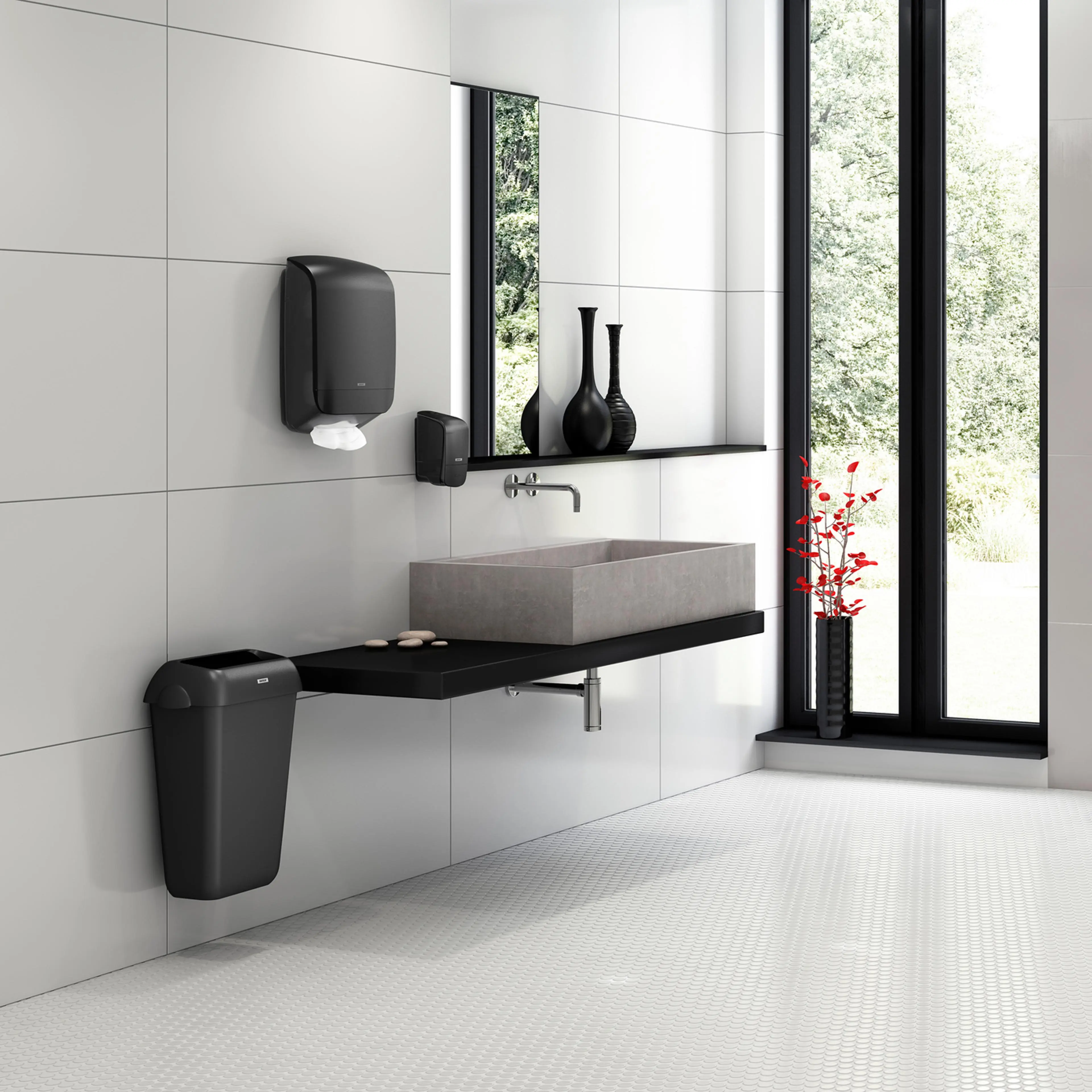 Katrin svarte plast dispenser på toalettrom