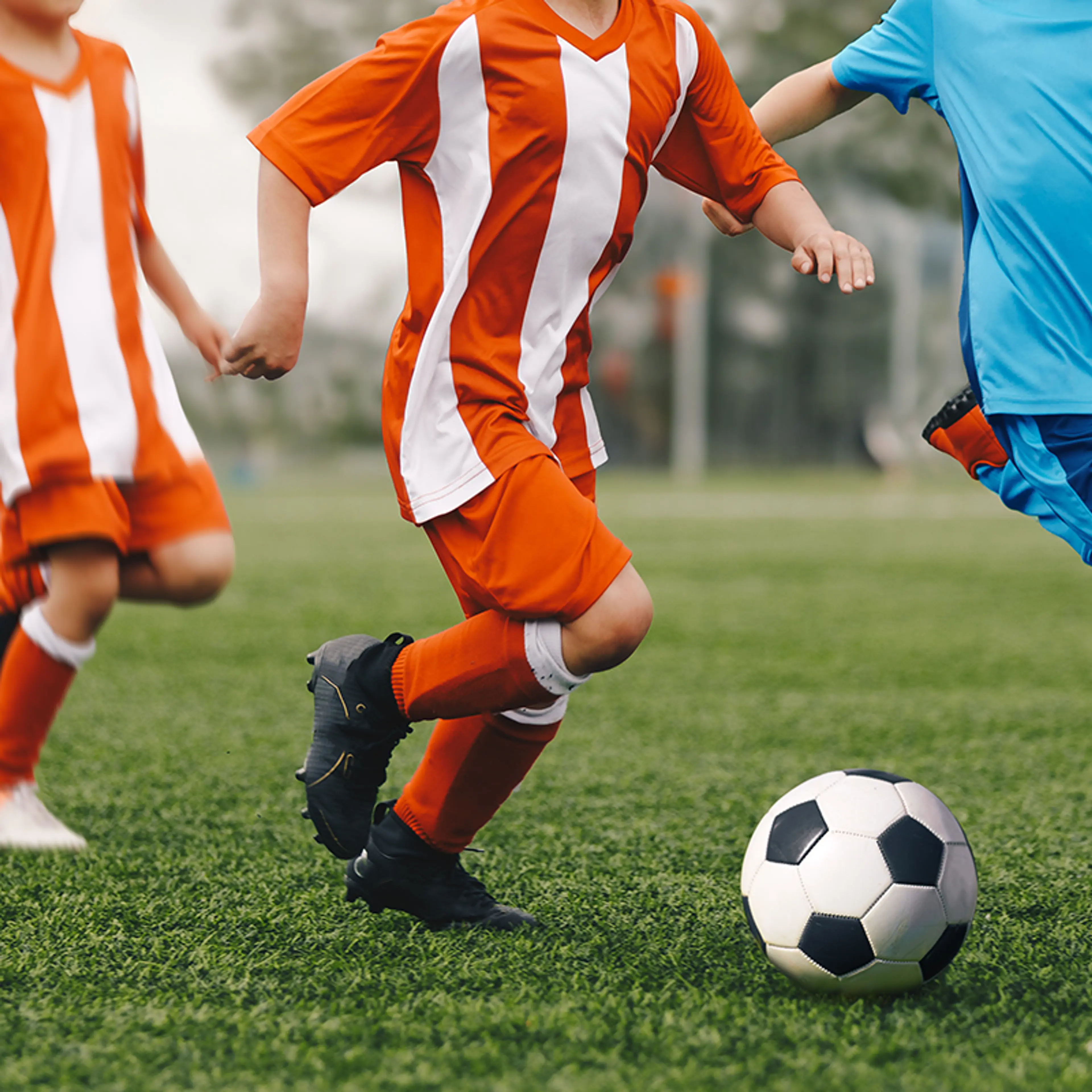 Fotballbane med barn