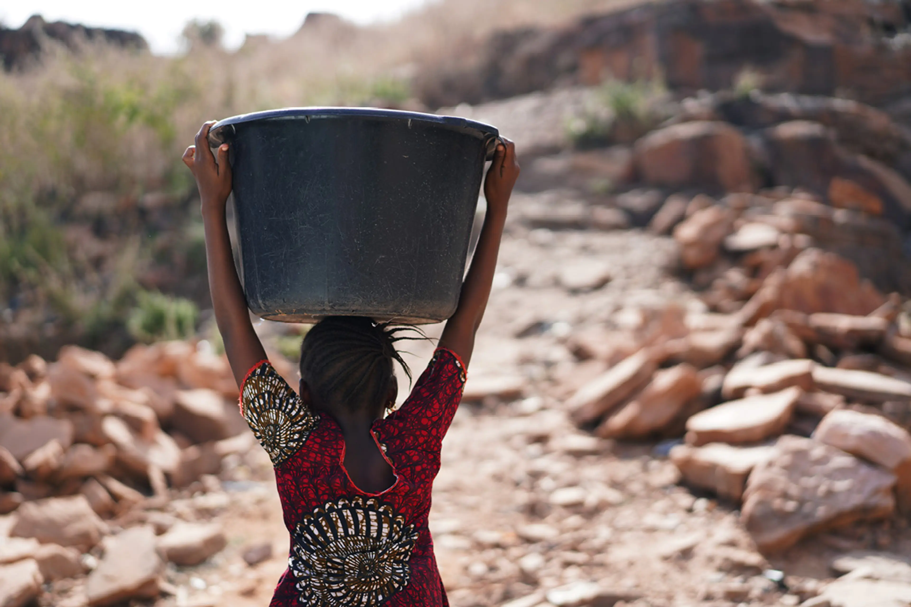 woman carry water