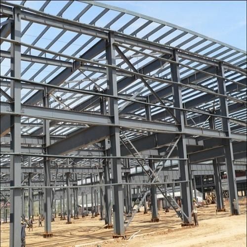 Multi-bay structural steel frame with roof purlins under construction