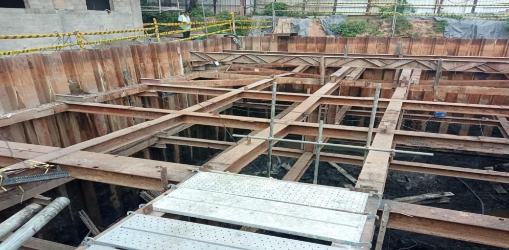 Steel sheet pile excavation supported by a grid of steel walers and struts