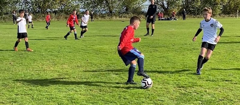 Photo of boys playing football