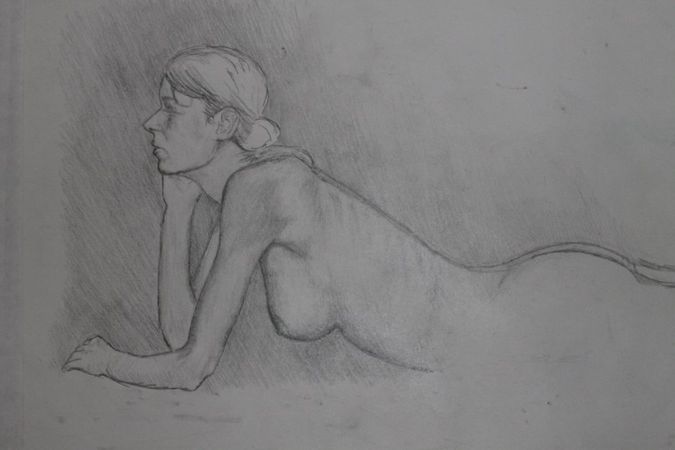 Pensil drawing of a woman laying down