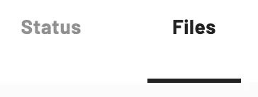 The files tab is to the right of the status tab