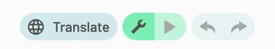 The translate button is to the left of the build and test mode toggle