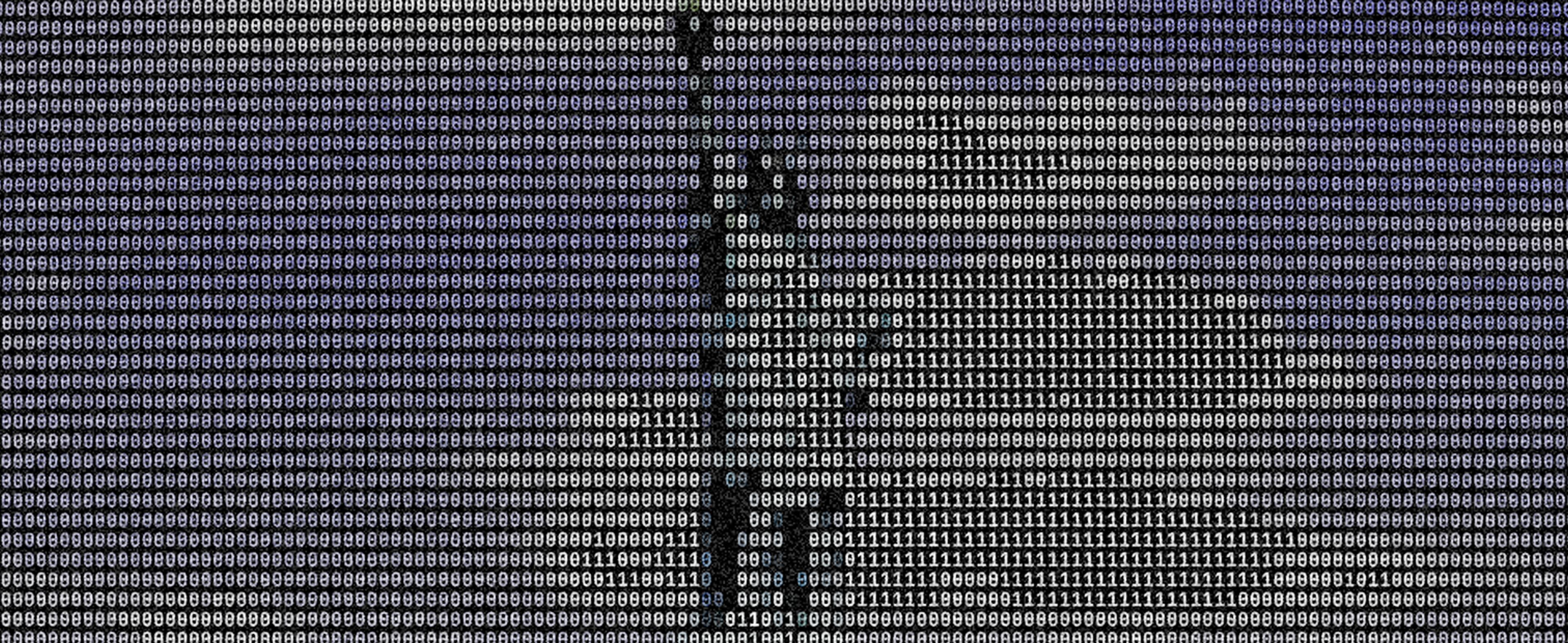A figure walking through a wall of ones and zeros, the Ghost wordmark across it.