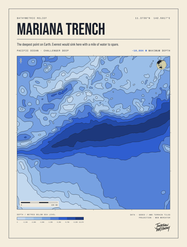 The Mariana Trench plate: pale to deep blue bands tracing a dark diagonal trench across the seafloor.