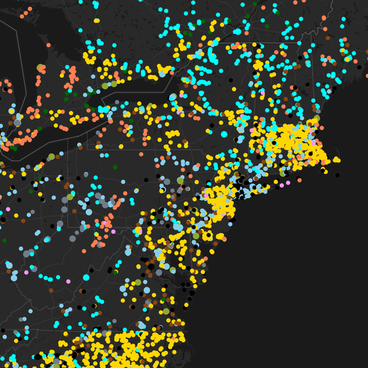 Power plants across the US northeast as coloured dots by fuel type on a dark basemap