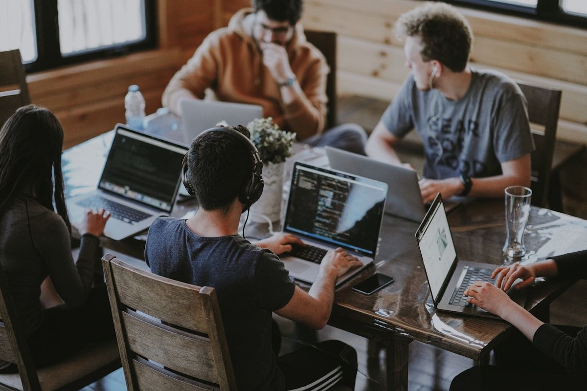 Team of professionals collaborating at a modern office table