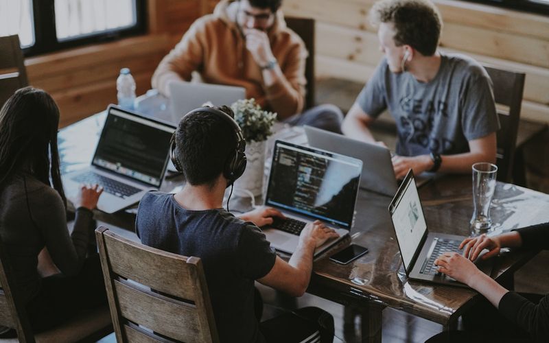 Team of professionals collaborating at a modern office table