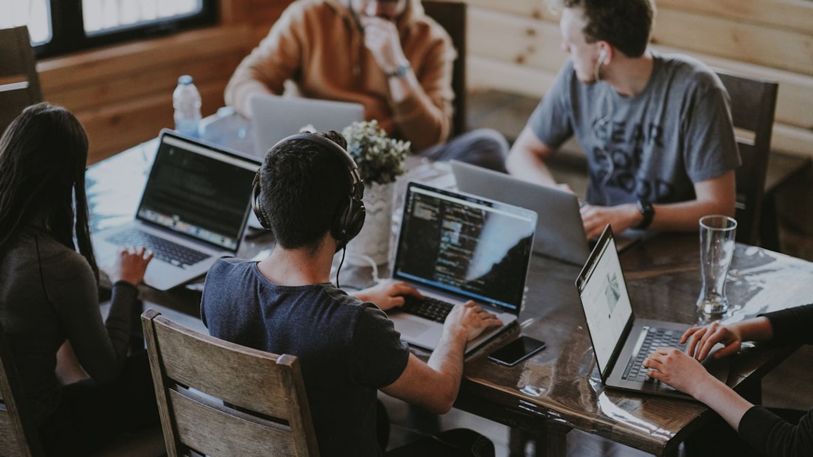 Team of professionals collaborating at a modern office table
