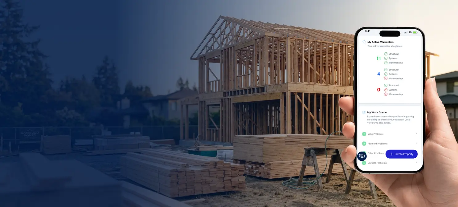 Hand holding a smartphone displaying the Maverick app with a house under construction in the background