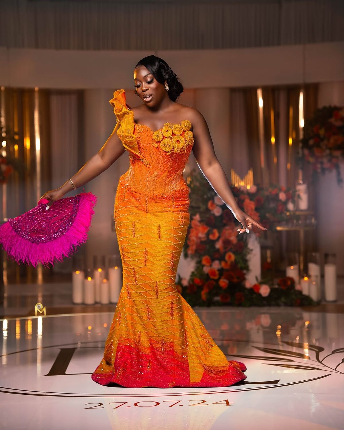 Bride laughing with bridesmaids before ceremony