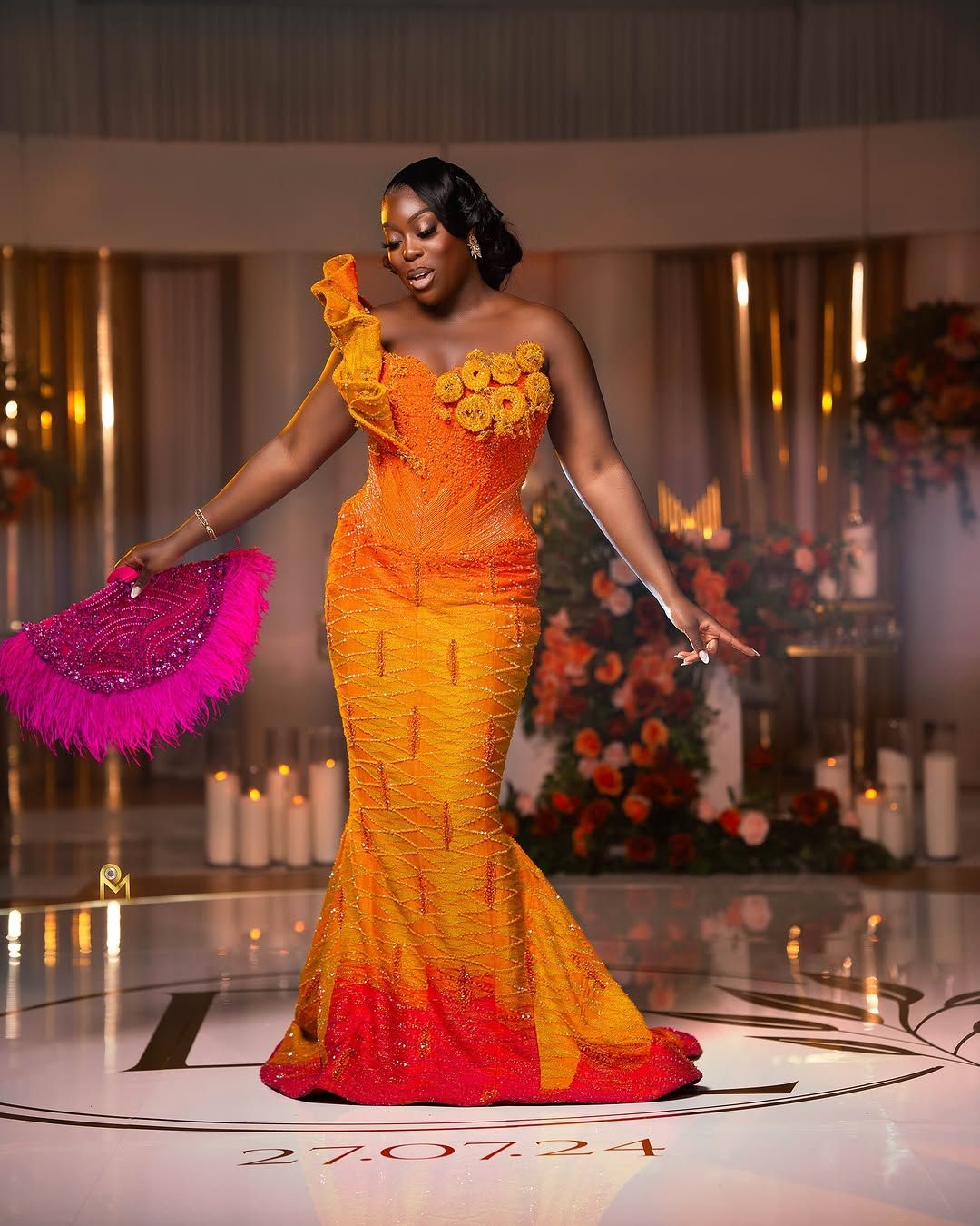 Bride laughing with bridesmaids before ceremony