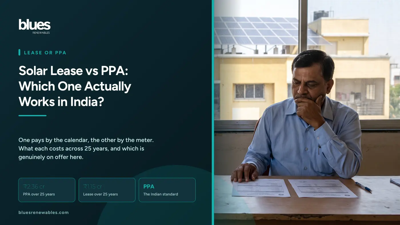Indian business owner at a desk comparing two printed solar contracts side by side with a rooftop solar array visible through the office window