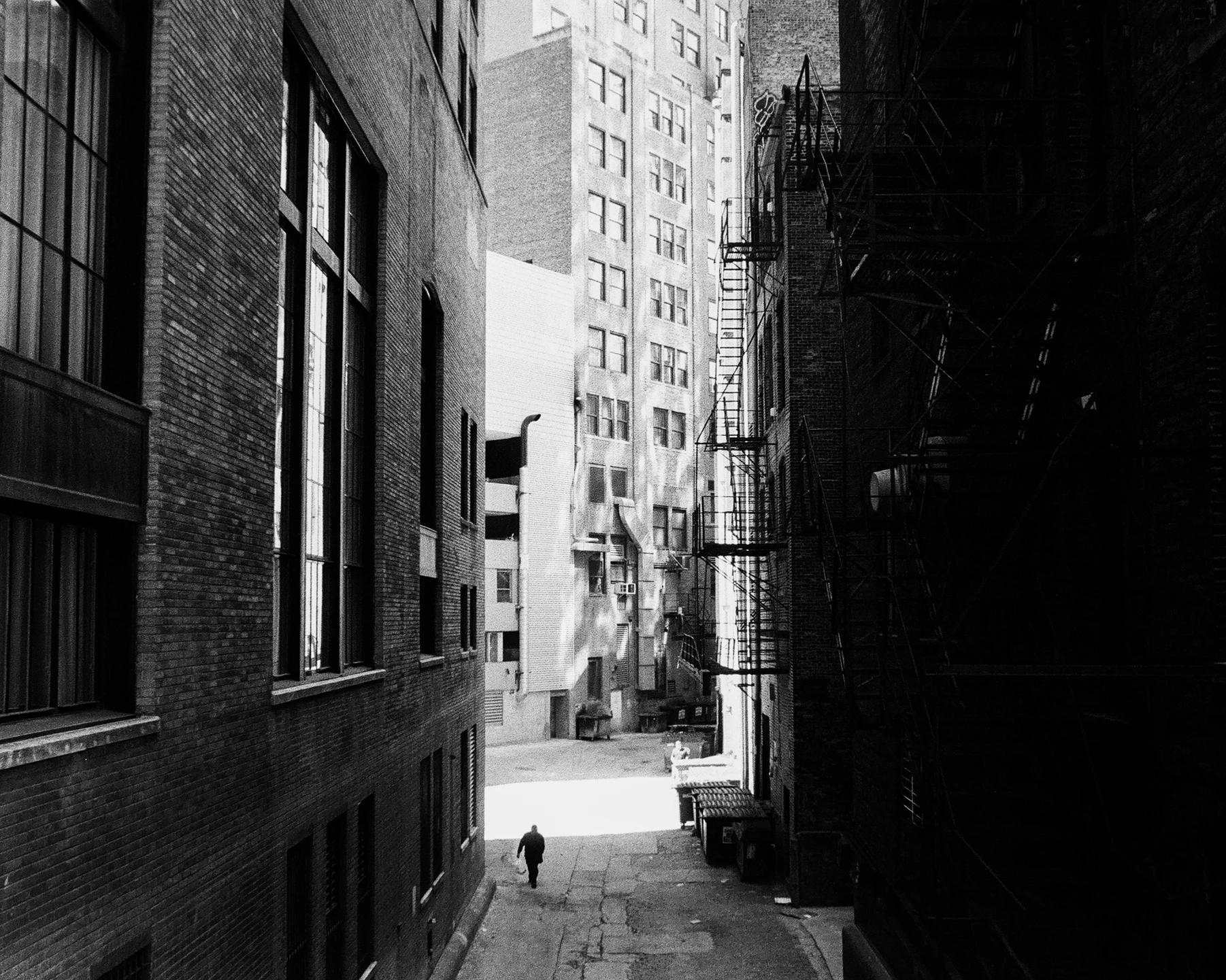 looking down almost empty alleyway 