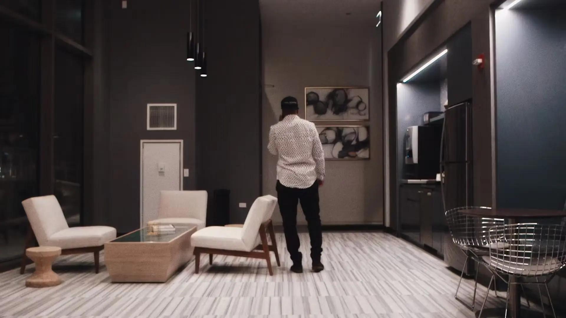 Tony Cartel with his back towards the camera on the set of Memoirs Music Video.