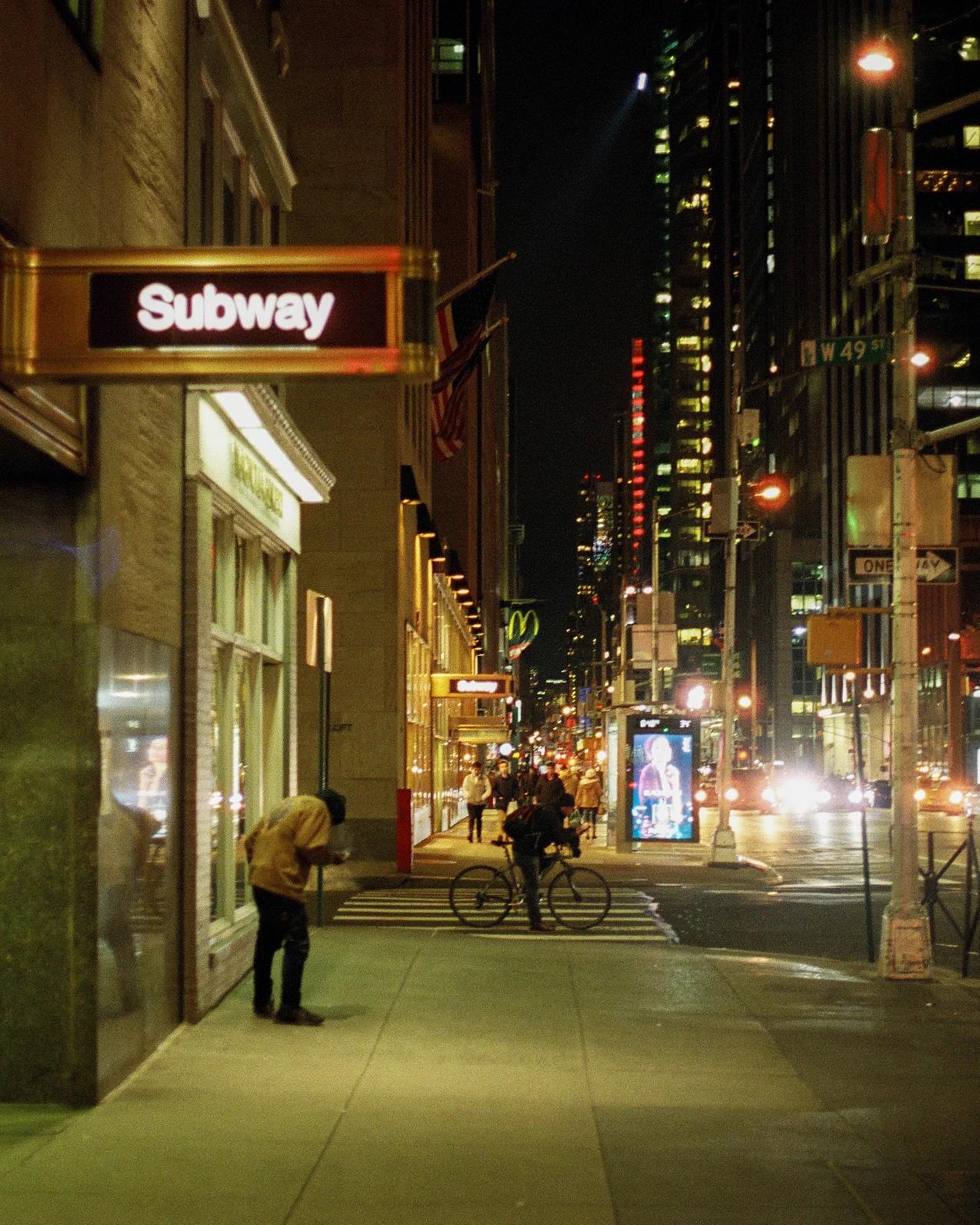 Looking down a street at night