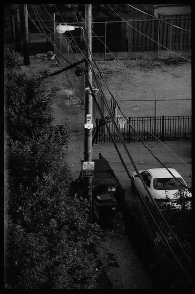 a car is parked in an empty alley